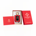 Unique’e Luxury Mashumaro Extrait de Parfum bottle presented in signature red luxury packaging
